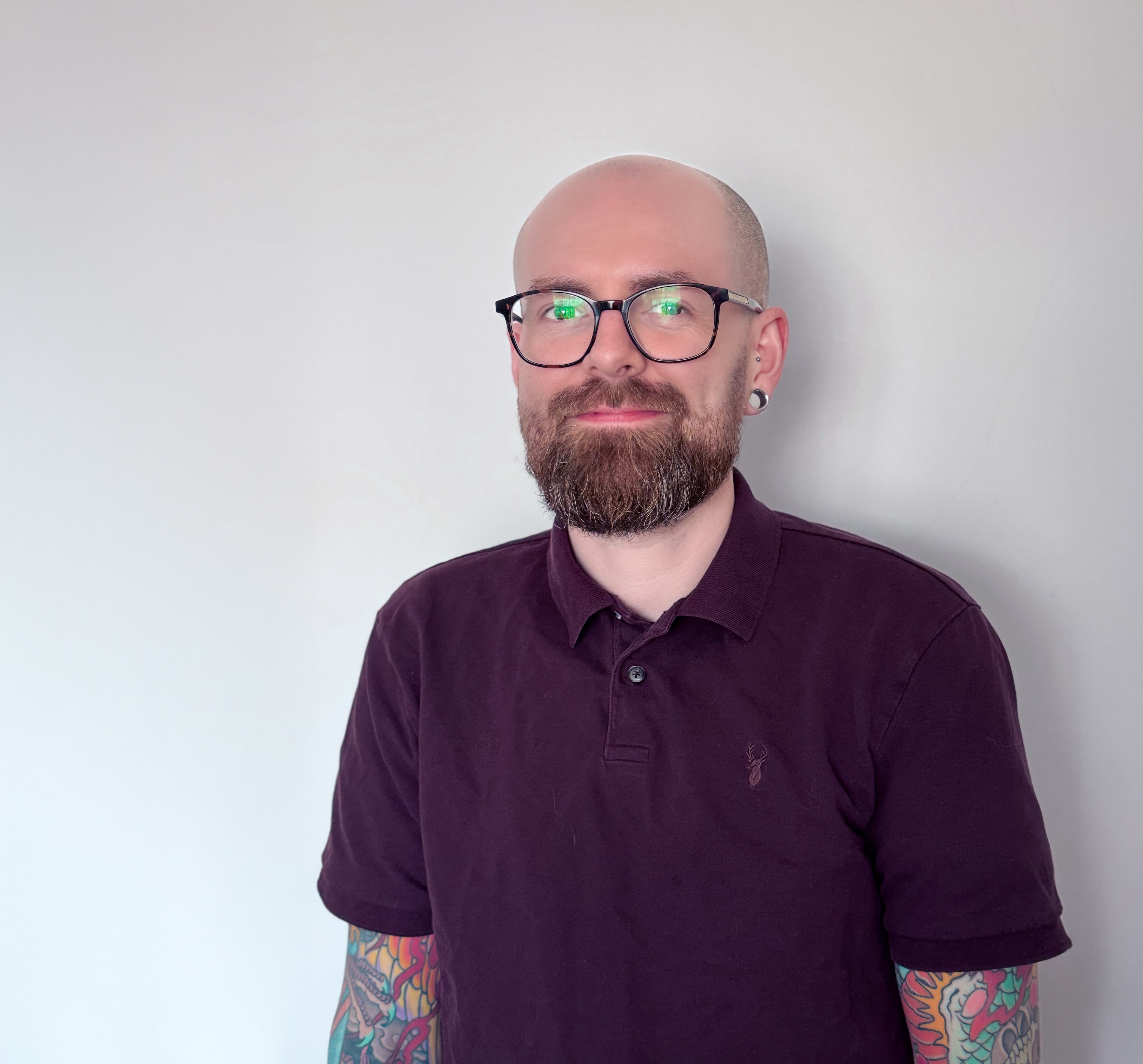 Christopher Dorey in a softly lit studio, blending developer precision with artist sensibility.